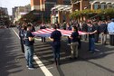 Staff Sgt. Anki Houng, 314th Recruiting Squadron enlisted recruiter and his delayed entry program members participate in the Philadelphia Veterans Day Parade. The future members of the Air Force received recognition and took part in displaying the American flag during the national anthem.