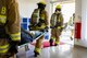 Firefighters from the 374th Civil Engineer Squadron carry victims of a simulated building collapse during a natural disaster exercise on Nov. 15, 2016, at Yokota Air Base, Japan. The exercise simulated a large scale earthquake in the Tokyo metropolitan area and the effects it would have on Yokota Air Base operations. (U.S. photo by Airman 1st Class Donald Hudson/Released)