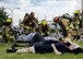 Firefighters from the 374th Civil Engineer Squadron practice first aid on victims of a simulated building collapse during a natural disaster exercise on Nov. 15, 2016, at Yokota Air Base, Japan. The exercise simulated the coordination of efforts between the U.S. and Japan Self-Defense Force after a natural disaster in the Tokyo metropolitan area. (U.S. photo by Airman 1st Class Donald Hudson/Released)