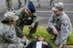Members from the 374th Medical Group determine what to do with a patient during a natural disaster exercise on Nov. 15, 2016, at Yokota Air Base, Japan. The exercise simulated the coordination of efforts between the U.S. and Japan Self-Defense Force after a natural disaster in the Tokyo metropolitan area. (U.S. photo by Airman 1st Class Donald Hudson/Released)