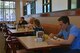 Team Shaw members eat a Thanksgiving meal at the Chief Master Sgt. Emerson E. Williams Dining Facility at Shaw Air Force Base, S.C., Nov. 24, 2016. The 20th Force Support Squadron hosts the annual Thanksgiving meal for service members, veterans and their families. (U.S. Air Force photo by Airman 1st Class Destinee Sweeney)