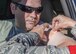 A member of the 49th Medical Group applies a bandage to an Airman on Oct. 4, 2016 at the base’s drive-thru immunization clinic. The 49th MDG set up the clinic in a lot across the street from the 49th MDG building to make it easier for active duty Holloman Airmen to obtain their annual flu shot. The 49th MDG staff administered the influenza vaccine to 720 Airmen. (U.S. Air Force photo by Airman 1st Class Alexis P. Docherty)