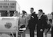 In a demonstration of air evacuation during “Operation Hi-Water” in Allentown, Pennsylvania, in 1956, several people are shown looking over transportable equipment used in the handling of polio cases. From left to right, they are Col. R.R. Carbonetta, MC; Brig. Gen. M.S. White, an Air Force surgeon; Msgr. Jocquin Salcedo of Columbia; and Mr. Julio Silva of the Pan American Union.  (Photo courtesy of National Archives and Records Administration.) 