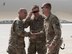 Brig. Gen. James Sears, 455th Air Expeditionary Wing commander, welcomes Lt. Gen. Jeffrey Harrigian, U.S. Air Forces Central Command commander, to Bagram Airfield, Afghanistan, Oct. 4, 2016. Harrigian spent time with Airmen and observing the mission of the 455th AEW. (U.S. Air Force photo by Tech. Sgt. Tyrona Lawson)