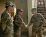 Lt. Gen. Jeffrey Harrigian, U.S. Air Forces Central Command commander, presents a coin to Tech. Sgt. Mark Williamson, 455th Expeditionary Medical Group, Bagram Airfield, Afghanistan, Oct. 5, 2016. Harrigian visited the 455th Air Expeditionary Wing to recognize Airmen and see the mission first hand. (U.S. Air Force photo by Capt. Korey Fratini)