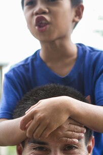 U.S. Marine Lance Cpl. Cristian Estrada, a 26-year-old infantry Marine with Echo Company, Battalion Landing Team, 2nd Battalion, 4th Marine Regiment, 31st Marine Expeditionary Unit, carries a Philippine student during a visit to Maruglo Elementary School on Col. Ernesto Ravina Air Base, Philippines, Oct. 6, 2016. Marines and Sailors with the 31st MEU visited the school to build unity between U.S. forces and the local residents during Philippine Amphibious Landing Exercise 33 (PHIBLEX). PHIBLEX is an annual U.S.-Philippine military bilateral exercise that combines amphibious capabilities and live-fire training with humanitarian civic assistance efforts to strengthen interoperability and working relationships. (U.S. Marine Corps Photo by Staff Sgt. T.T. Parish/Released)