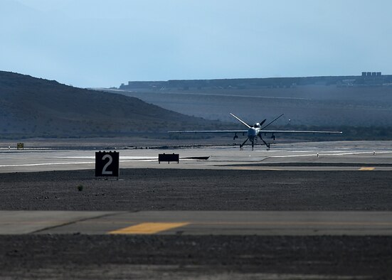 An MQ-9 Reaper prepares for takeoff Aug. 25, 2016, at Creech Air Force Base, Nevada. The larger, more capable MQ-9 will replace the MQ-1 Predator in active duty units. (U.S. Air force photo by Airman 1st Class James Thompson)