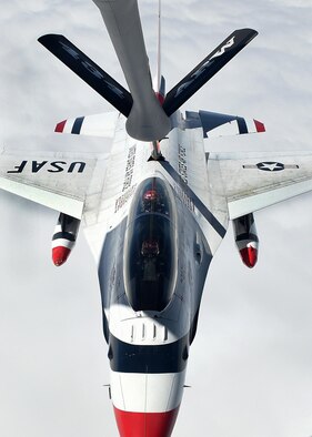 Two Grissom KC-135R Stratotanker had the rare privilege of refueling F-16 Fighting Falcon aircraft from the U.S. Air Force Demonstration Squadron over the midwest United States, Sept. 7, 2016. The thunderbird, enroute to Fort Wayne, Ind., required a refuel on its way for the Air Show scheduled to take place Sept. 10-11, 2016. (U.S. Air Force photo/Senior Airman Andrew Crawford)