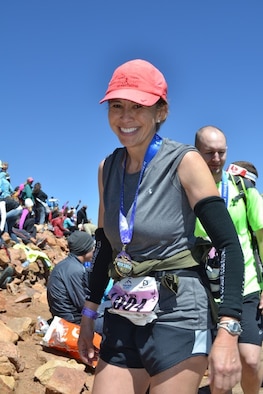 Dr. (Lt. Col.) Audrey Hall, staff pediatrician and Air Force Reserve Command Individual Mobilization Augmentee assigned to Peterson Air Force Base’s 21st Medical Group completed the Pikes Peak Ascent race near Colorado Springs, Colo. this past August in preparation for this year’s U. S. Air Force Marathon. Hall is an avid runner who has found the right balance between her Reserve career, civilian career, family and fitness. (Courtesy photo)