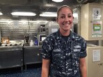 Navy Petty Officer 2nd Class Farren Lohndorf is a gunner's mate from Norfolk, Virginia, who is serving with about 300 other sailors on the Arleigh Burke-class guided missile destroyer USS Barry that’s deployed in Yokosuka, Japan. Lohndorf posed for a photo aboard the USS Barry, Sept. 7, 2016. Service has great meaning to Lohndorf, she explained. "To me,” she said, “it's all about defending my country so that my family can keep their freedom." DoD photo by Lisa Ferdinando