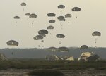 Paratroopers assigned to Company D, 2nd Battalion, 503rd Infantry Regiment, 173rd Airborne Brigade, descend on Dąbrówka lookout in Chechło, Poland during airborne insertion exercise Bayonet Strike, Sep. 12, 2016. Army photo by Sgt. Lauren Harrah