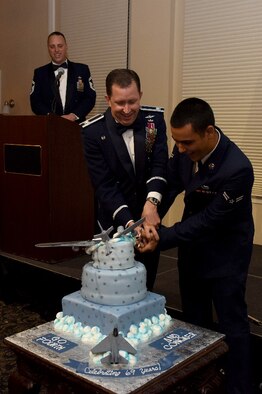 Col. Christopher Sage (left), 4th Fighter Wing commander, and Airman 1st Class Asher Sylvia, 4th Component Maintenance Squadron aircrew egress systems apprentice, cut the cake at the Air Force ball, Sept. 17, 2016, at Seymour Johnson Air Force Base, North Carolina. Team Seymour celebrated the Air Force’s 69th birthday by hosting a ball, featuring guest speaker retired Tech. Sgt. Matthew Slaydon. (U.S. Air Force photo by Miranda A. Loera)