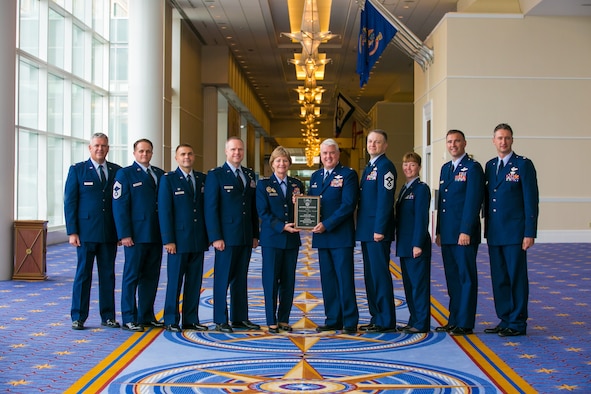 926th Wing members pose with Lt. Gen. Maryanne Miller, Chief of Air Force Reserve, upon receipt of their Air Force Association Award on Sept. 19. (courtesy photo)