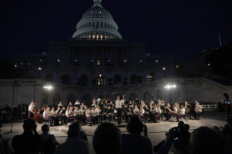 On Aug. 30, 2017, the Marine Band performed on the West Terrace of the United States Capitol. The program, conducted by Col. Jason K. Fettig, included works by John Philip Sousa, Charles Ives, and Paul Taffanel. (U.S. Marine Corps photo by Master Sgt. Amanda Simmons/released)