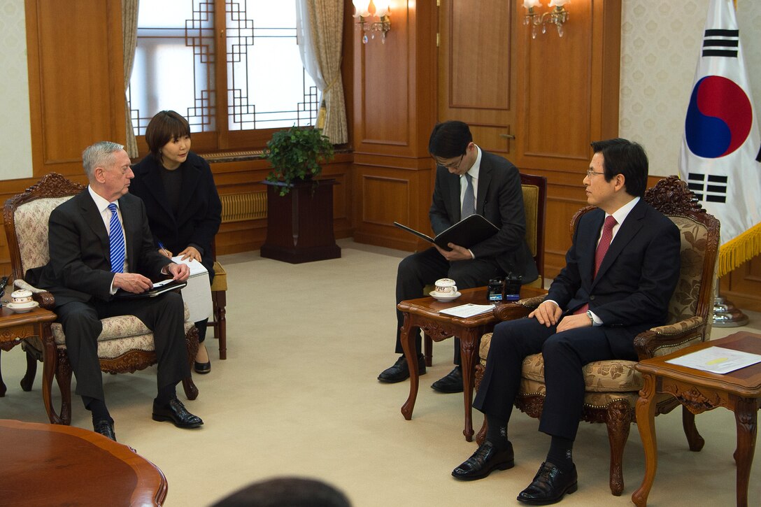 Defense Secretary Jim Mattis, left, meets with the acting President of South Korea, Prime Minister Hwang Kyo-ahn.