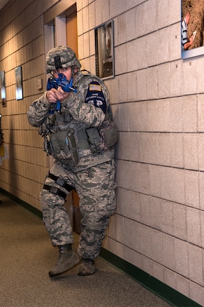 170207-Z-MI929-019 - U.S. Air Force Staff Sgt. Jeffry Declercq, Security Forces specialist at the 127th Wing Selfridge Air National Guard Base, Michigan, searches a building for suspects and victims on base during an active shooter exercise on Feb. 7, 2017. The 127th Wing performed an active shooter response exercise to prepare Airmen to survive an incident on base or in their civilian lives. (Michigan Air National Guard photo by Terry L. Atwell/released)