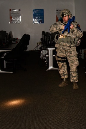 170207-Z-MI929-022 - U.S. Air Force Staff Sgt. Jeffry Declercq, Security Forces specialist for the 127th Wing at Selfridge Air National Guard Base, Michigan, searches a building for suspects and victims during an active shooter exercise on Feb. 7, 2017. The 127th Wing performs exercises like this one to prepare airmen and civilian employees to survive an incident on base or in their civilian lives. (Michigan Air National Guard photo by Terry L. Atwell/released)