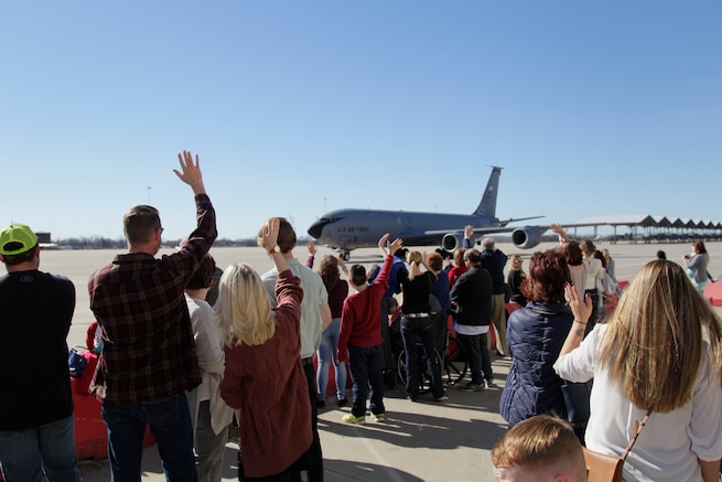 170219-Z-NQ307-070 -- Family members wave at a KC-135 Stratotanker flown by the 127th Air Refueling Group as it taxis in to park at Selfridge Air National Guard Base, Mich. on February 19th, 2017. Approximately 85 airmen and three aircraft from the Michigan Air National Guard's 127th ARG returned from a 60 day deployment to the Central Command area of responsibility. (U.S. Air National Guard photo by TSgt. Rachel Barton)