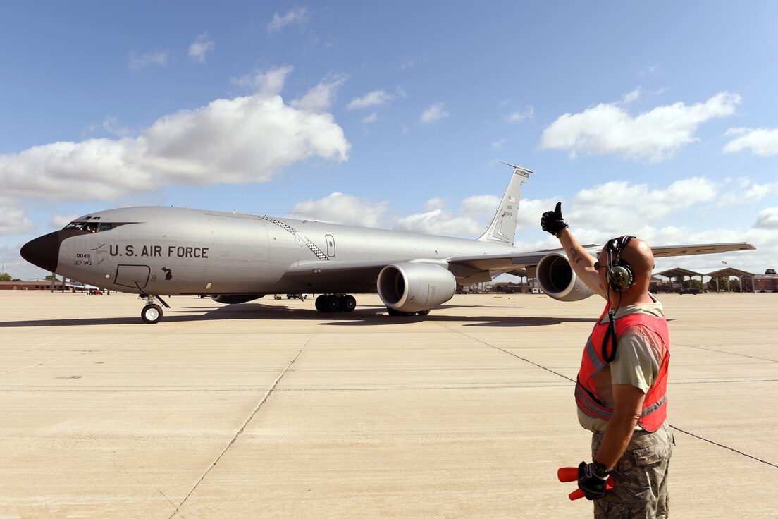 170714-Z-EZ686-043 - Technical Sgt. David Thomas, Crew Chief of the 127th Air Refueling Group, marshals out a KC-135 Stratotanker flown by the 171st Air Refueling Squadron from Selfridge Air National Guard Base, Mich., at Selfridge Air National Guard Base on July 14, 2017.  Primarily used as an air-to-air refueling platform, the KC-135 at Selfridge is operated and maintained by Airmen from the Michigan Air National Guard's 127th Air Refueling Group, 171st Air Refueling Squadron, 191st Maintenance Squadron and related organizations. (U.S. Air National Guard photo by MSgt. David Kujawa/Released)