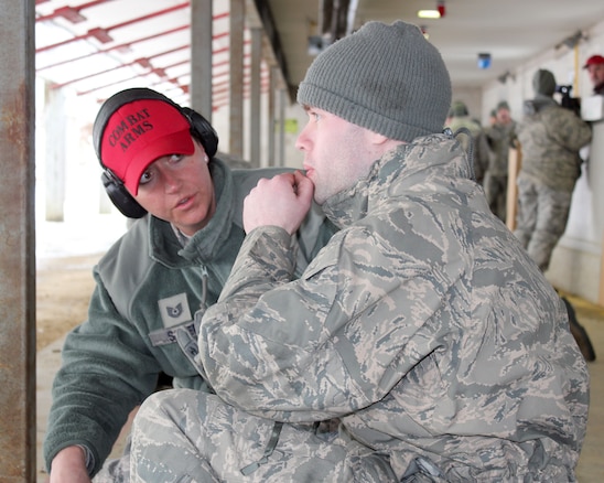Tech. Sgt. Jennifer Sauer works with Senior Airman Scott Lange at the rifle marksmanship range at Selfridge Air National Guard Base, Mich., Feb. 4, 2018. The Citizen-Airmen of the 127th Wing spent the February regularly scheduled drill focused on expeditionary skills training.