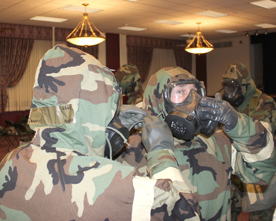 Michigan Citizen-Airmen don protective chemical gear during a readiness training exercise at Selfridge Air National Guard Base, Feb. 5, 2018. Airmen of the 127th Wing spent the February 2018 drill period reviewing basic warfighting and readiness skills.