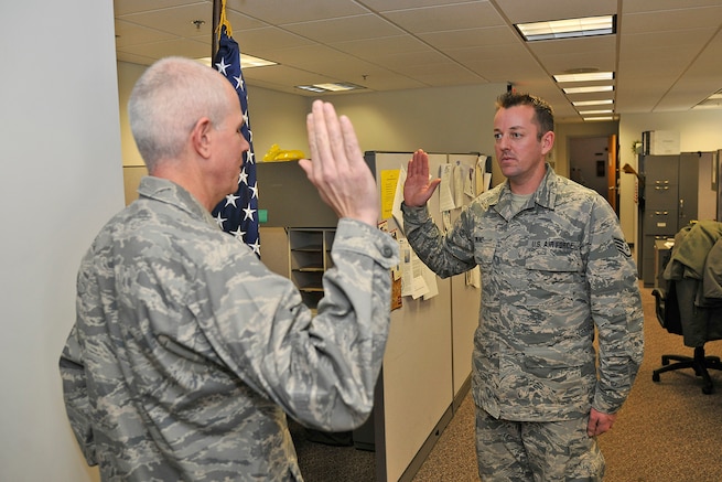 Members of the 127th Wing re-enlist in the Michigan Air National Guard at Selfridge Air National Guard Base, Mich., Jan. 6, 2018. Over the past year there were 280 enlistments and re-enlistments in the Michigan Air National Guard here.