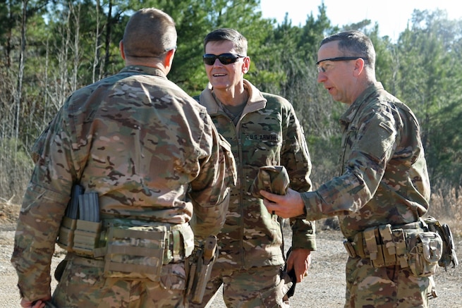 Gen. Joseph L. Votel [center], commander of the United States Central Command, greets Col. Scott Jackson [right] and Command Sgt. Maj. Christopher D. Gunn [left], the command team for the 1st Security Force Assistance Brigade at the Joint Readiness Training Center at Fort Polk, La., Jan. 18, 2018. Votel visited for an internal brief prior to 1st SFAB’s upcoming deployment to Afghanistan in the spring of 2018. SFABs are being developed and deployed as a solution to an enduring Army requirement in support of the defense strategy. (U.S. Army photo by Pfc. Zoe Garbarino/Released)