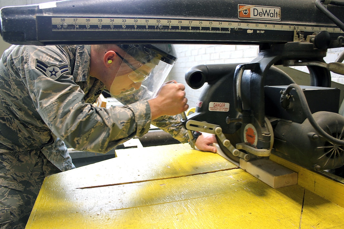 Airman 1st Class Paul Prohaszka, a member of the Structures flight of the 127th Civil Engineer Squadron, works in the wood shop at Selfridge Air National Guard Base, Mich., May 4, 2018. Michigan Citizen-Airmen at Selfridge conducted a four-day training drill at Selfridge to refresh career-specific and warfighting skills. (U.S. Air National Guard photo by Tech. Sgt. Dan Heaton)