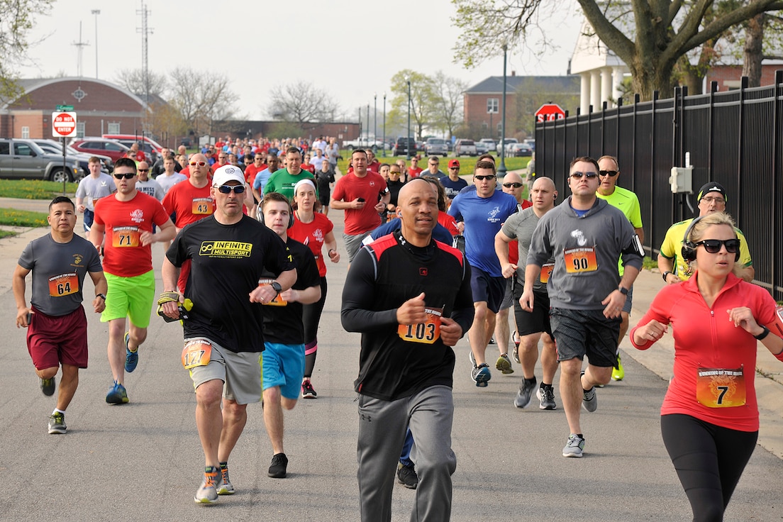 Members of Team Selfridge participate in the second annual, "Running of the Hawgs," event here on May 6, 2018. The race, organized by the 127th Maintenance Group here, invited civilians and servicemembers to compete in either a 5k run or a mile-long walk on a measured course, on base. Proceeds from the event were donated to the Adopt-A-Family organization. (U.S. Air Force photo by Senior Airman Ryan Zeski)