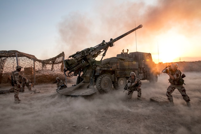 French soldiers, assigned to Task Force Wagram, fire a French Ceasar in support of Operation Roundup, in Al Qa'im, Iraq, May 16, 2018. As a non-permanent force the Coalition aims to enable the Iraqi security forces to be self-sufficient. (U.S. Army photo by Spc. Zakia Gray)