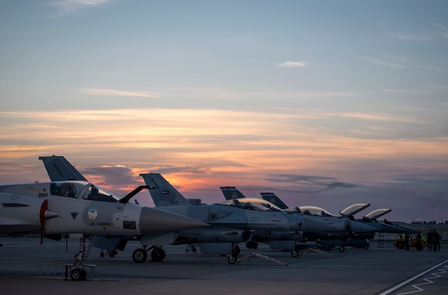 U.S. Air Force and UAE F-16 Fighting Falcons stand on display at Sakhir Air Base during the Bahrain International Airshow (BIAS) 2018, Bahrain, Nov. 14, 2018. BIAS is a biennial, three-day aviation and aerospace industry event that provides the U.S. military an opportunity to highlight DOD aviation’s flexibility, speed and agility. (U.S. Air Force photo by Senior Airman Gracie I. Lee)