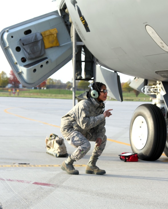 Senior Airman Leslie Whitfield performs a visual inspection of a KC-135 Stratotanker at Selfridge Air National Guard Base, Mich., Nov. 4, 2019.