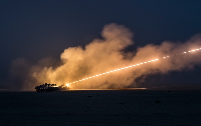 U.S. Soldiers assigned to the 65th Field Artillery Brigade, and soldiers from the Kuwait Land Forces fire their High Mobility Artillery Rocket Systems (U.S.) and BM-30 Smerch rocket systems (Kuwait) during a joint live-fire exercise, Jan. 8, 2019, near Camp Buehring, Kuwait. The U.S. and Kuwaiti forces train together frequently to maintain a high level of combat readiness and to maintain effective communication between the two forces. (U.S. Army photo by Sgt. James Lefty Larimer)