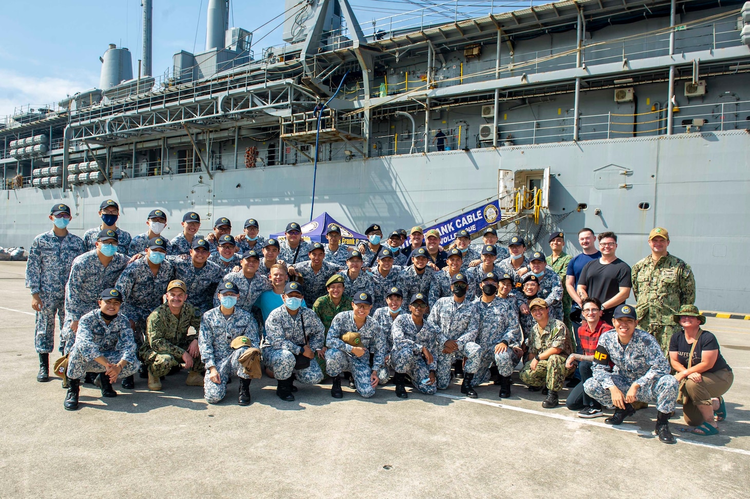 Republic Of Singapore Navy Officials Visit USS Frank Cable Commander