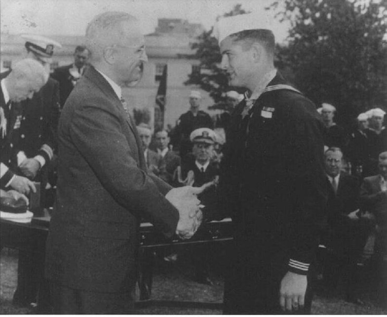 An old photograph shows when corpsman Robert E. Bush received the Medal of Honor from President Harry S. Truman Oct. 5, 1945 in Washington.