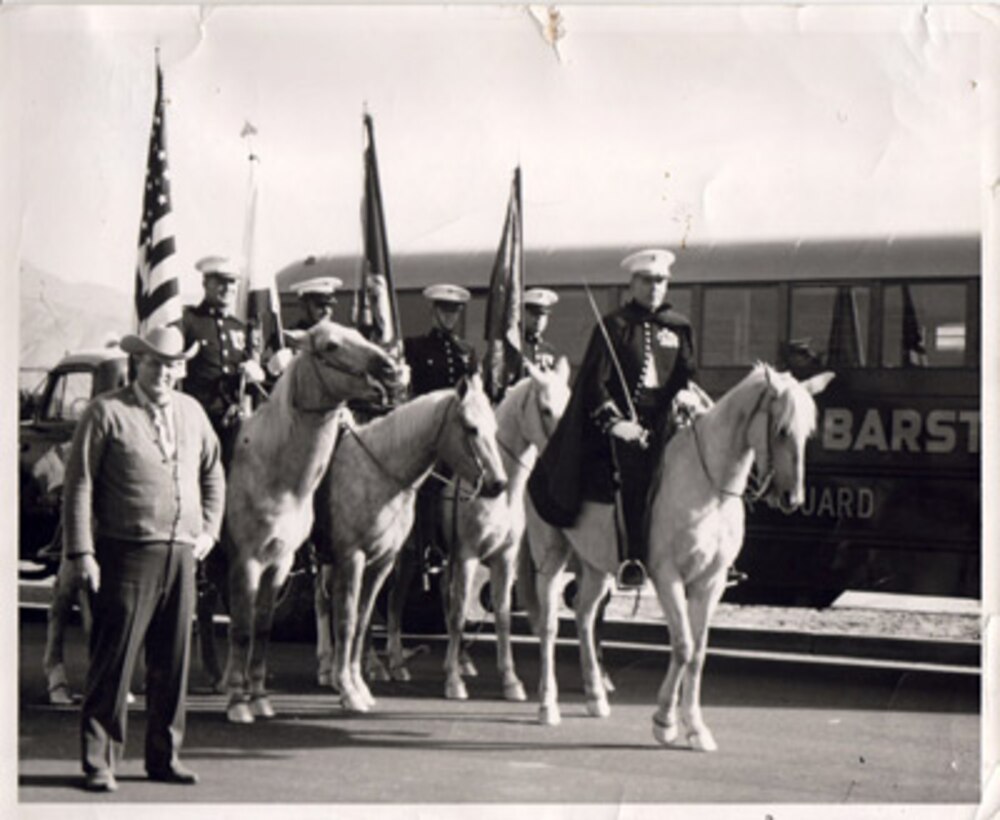 The MCLB Barstow Mounted Color Guard made its first appearance at a parade in Ridgecrest, Calif. The riders were Lt. Col. Robert Lindsley (lead), Capt. Glenn Legge, Gunnery Sgt. Alvin Smith, Sgt. Ken Parrish and Sgt. Gibson.