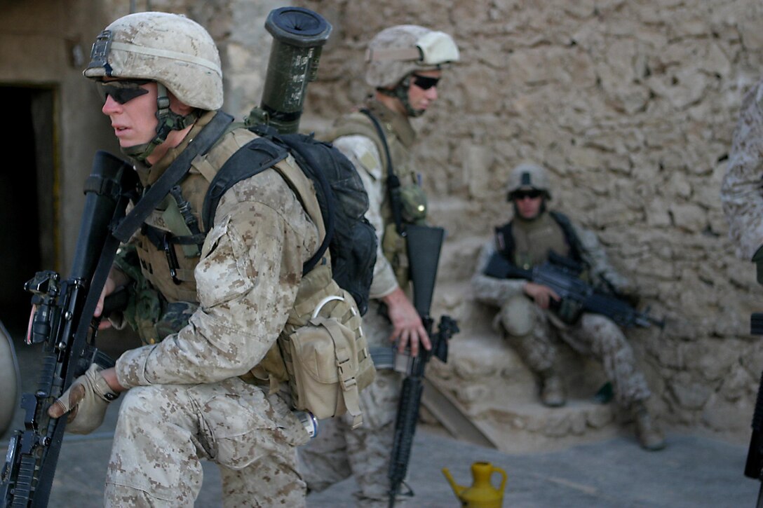 U.S. Marine Corps Lance Cpl. Thomas F. Hiser conducts a patrol in Haditha, Iraq, Aug. 8, 2006. Hiser is attached to India Company, 3rd Battalion, 3rd Marine Regiment, Regimental Combat Team 7, I Marine Expeditionary Force (Forward) in support of Operation Iraqi Freedom in the Al Anbar province of Iraq. (U.S. Marine Corps photo by Cpl. Brian M. Henner) (Released)