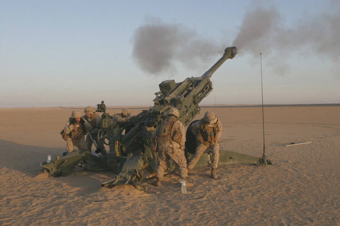 Marines from Artillery Battery, Lima Company, Battalion Landing Team 2/6, fire a round from an M777 155mm Lightweight Howitzer, Towed, during a training mission conducted during sustainment training at Camp Buehring, Kuwait, Jan. 05, 2009. The 26th Marine Expeditionary Unit is currently deployed to the U.S. Central Command Area of Operation as part of its 2008-2009 deployment.