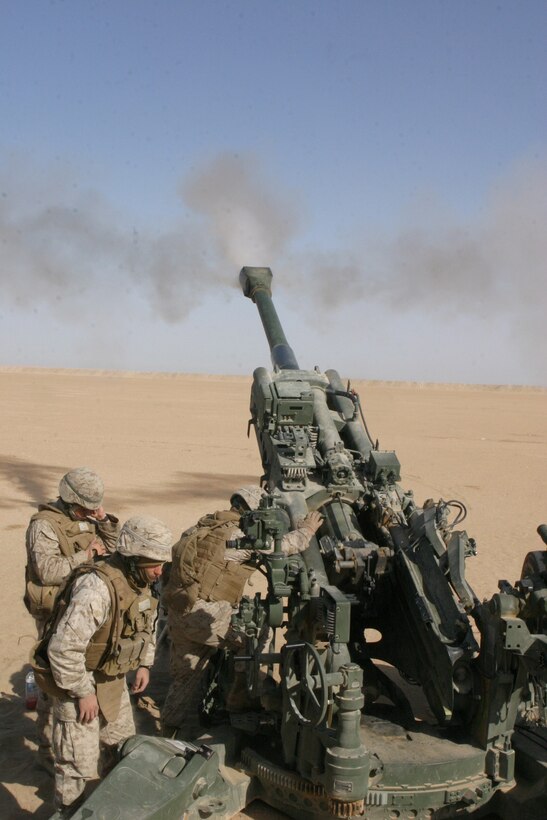 Marines from Artillery Battery, Lima Company, Battalion Landing Team 2/6, fire a round from an M777 155mm Lightweight Howitzer, Towed, during a firing mission conducted during sustainment training at Camp Buehring, Kuwait, Jan. 05, 2009. The 26th Marine Expeditionary Unit is currently deployed to the U.S. Central Command Area of Operation as part of its 2008-2009 deployment.