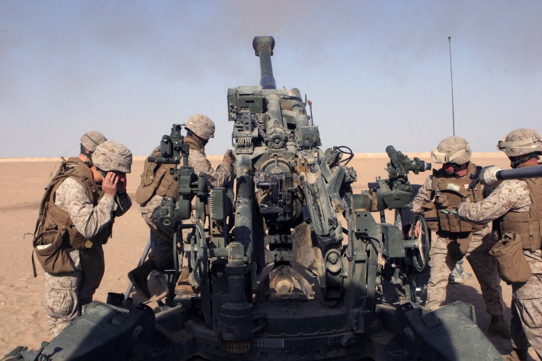 Marines from Artillery Battery, Lima Company, Battalion Landing Team 2/6, fire a round from an M777 155mm Lightweight Howitzer, Towed, during a firing mission conducted during sustainment training at Camp Buehring, Kuwait, Jan. 05, 2009. The 26th Marine Expeditionary Unit is currently deployed to the U.S. Central Command Area of Operation as part of its 2008-2009 deployment.