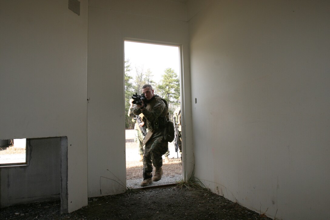 ::n::Marines from Bravo Company, Battalion Landing Team, 1st Battalion 8th Marines, began the Mechanized Raid Course, Jan 9, 2006. The Bravo Co., Marines are continuing the pre-deployment training regime by completing the 9-day course while here at Ft. A.P. Hill, Va. ::n::During the first days of the course the Marines learn the fundamentals of a raid and how to deal with the various aspects of conducting a raid. By the end of the course Marines will have learned how to incorporate mechanized units such as, the Assault Amphibious Vehicle or M1A1 Main Battle Tank into their plans to successfully carryout a mechanized raid in an actual combat scenario. ::n::