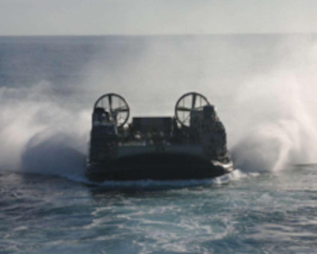 A Landing Craft Air Cushion (LCAC), Assault Craft Unit, 13th Marine Expeditionary Unit, prepares to embark aboard the USS Bonhomme Richard after conducting small boat recovery exercises off the coast of Camp Pendleton, Ca  23 January 2007. The exercise is part of the 13th MEU pre-deployment training conducted at-sea.  (Official Marine Corps photo by Lance Cpl. Kyle J Keathley) Released.