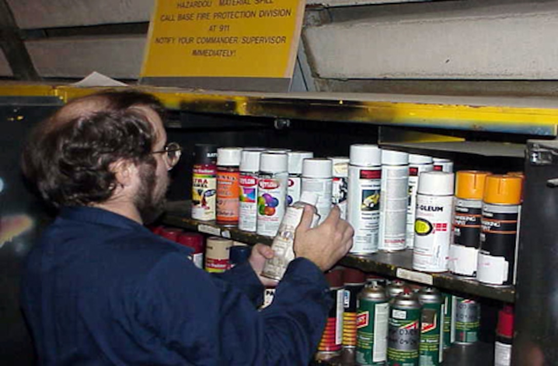 MARINE CORPS BASE CAMP LEJEUNE, N.C. - A worker takes inventory at the Hazardous Material Control Center in building 977. The HMCC, located on Michael Street, reissues serviceable hazardous materials back to various units instead of being disposed of as hazardous waste. (photo courtesty os the Hazardous Material Control Center)