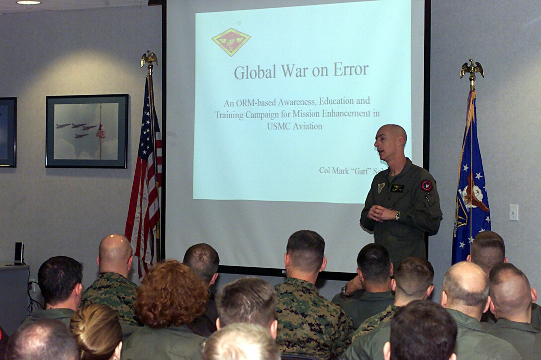 Col. Mant C. Hawkins, commanding officer, Marine Aircraft Group 41, 4th Marine Aircraft Wing talks to his Marines before the MAG's Global War on Error conference kicks off Jan 29, 2004 at Naval Air Station Joint Reserve Base, Fort Worth, Texas. The program is designed to bring awarenress and education to stop individual error, which is the number one factor in aviation mishaps. (Offical USMC photo by Staff Sgt. Rusty Baker)