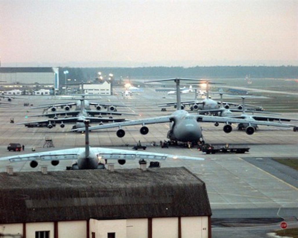 U. S. Air Force C-141 Starlifters, C-5 Galaxy's, and C-17 Globemaster III's, are staged on the ramp of Rhein-Main Air Base, Germany, on Dec. 12, 1995. Long known as the "Gateway to Europe", Rhein-Main has become a marshaling point for the NATO Enabling Force of Operation Joint Endeavor. Enabling forces are moving into the Croatia, Bosnia and Herzegovina, and Slovenia theaters of operation to prepare entry points for the main Implementation Force. 