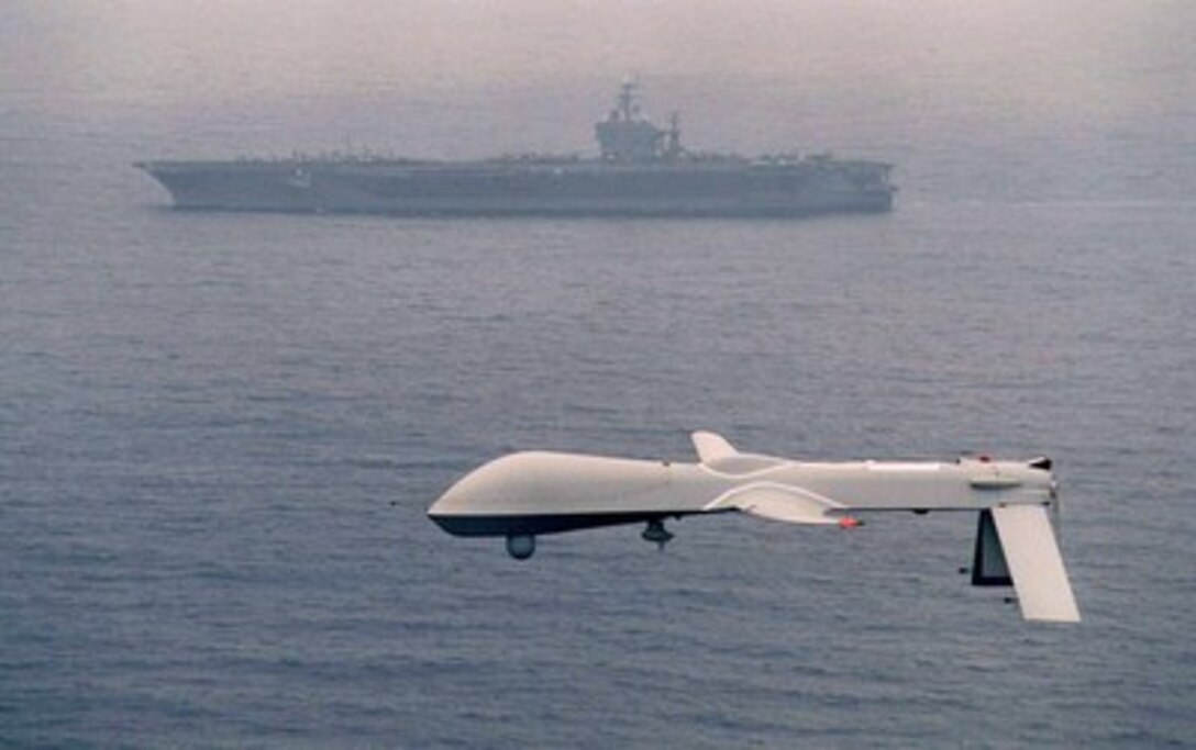 A Predator Unmanned Aerial Vehicle (UAV) is warmed-up on a runway at San Nicholas Island off the coast of southern California on Nov. 20, 1995. The UAV is being prepared for a simulated Navy aerial reconnaissance mission, the Predator's first maritime mission with a carrier battle group. The Predator provides near, real-time infrared and color video to intelligence analysts and controllers on the ground and the ship. 