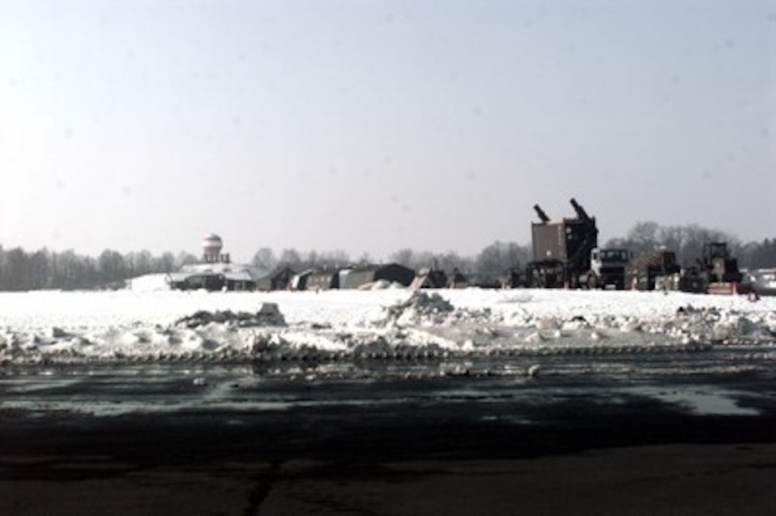 A parking apron at Taszar Air Field near Kaposvar, Hungary, has become a staging area for personnel and equipment being flown in to support the NATO Enabling Force of Operation Joint Endeavor. Enabling forces are moving into the Croatia, Bosnia and Herzegovina, and Slovenia theaters of operation to prepare entry points for the main Implementation Force. 