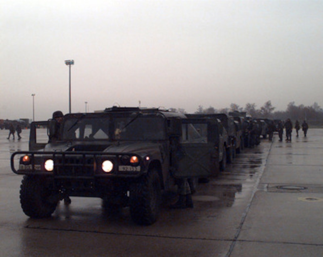 U. S. Army vehicles from the 18th Military Police Battalion are lined up for inspection at Rhein-Main Air Base, Germany, on Dec. 22, 1995, for deployment to NATO's Operation Joint Endeavor. Military equipment from all over the world is being deployed to Bosnia and Herzegovina where it will be used by the NATO Implementation Force (IFOR). 