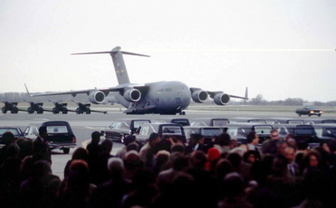 A U.S. Air Force C-17 Globemaster III carrying the remains of Commerce Secretary Ron Brown and other members of the Commerce mission to Bosnia and Herzegovina who were killed in a plane crash near Dubrovnik, Croatia, on April 3, taxis to a parking spot on the ramp at Dover Air Force Base, Del., on April 6, 1996. 
