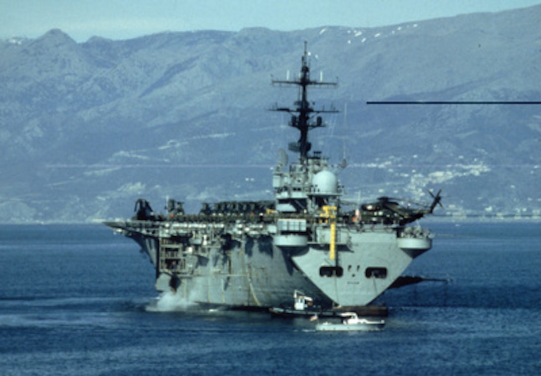 President Clinton has ordered the amphibious assault ship USS Guam (LPH 9), shown in this file photo, to steam towards the coast of Liberia to assist in the evacuation of U.S. citizens and foreign nationals known as Operation Assured Response. Joining the Guam will be the amphibious transport dock ship USS Trenton (LPD 14) and the dock landing ship USS Portland (LSD 37). All three ships are designed to support amphibious operations via helicopters or landing craft. The Guam carries a complement of U.S. Marine Corps CH-53 Sea Stallion and CH-46 Sea Knight helicopters. 